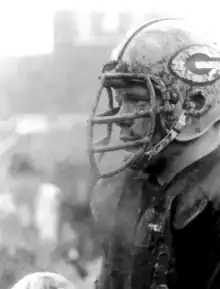 Black and white photo of Bowman wearing a helmet