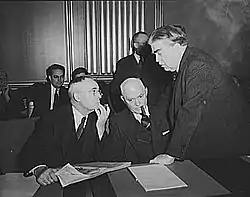 Image 40John L. Lewis (right, President of the United Mine Workers, confers with Thomas Kennedy (left), UMW Secretary-Treasurer of the UMW, and a UMW official at the War Labor Board in 1943 about a coal miners' strike.