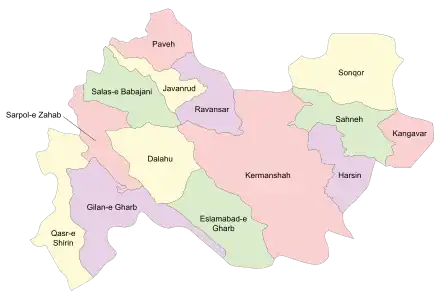 Location of Kangavar County in Kermanshah province (right, pink)