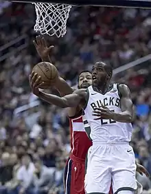 Khris Middleton of the Milwaukee Bucks shooting a lay up