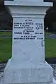 Inscription on one of the four sides of the memorial