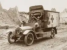 Knocker and Chisholm in their converted Wolseley Ambulance, Pervyse, Belgium, c. 1916