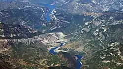 River Drin in the area of Koman, with the village, the dam and the lake