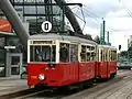 A historic N car with the 4ND1 trailer in tow in Katowice, 2008