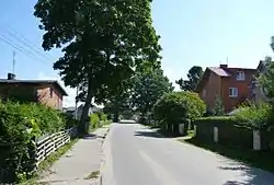 Ulica Bursztynowa, the main street of Kopalino, facing east