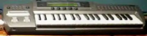 A grey colored synthesizer instrument