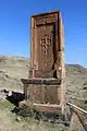 Khachkar monument of 1175 at the hilltop cemetery.