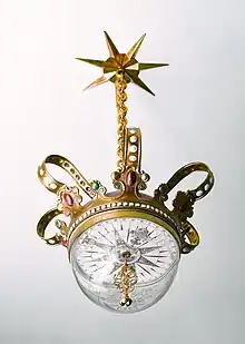 A tell-tale crown compass hanging from the ceiling