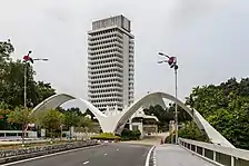 White tall building and two arches