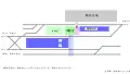 Schematic of station layout. Gray is the station forecourt. The narrow blue rectangle is the Miniami Aso platform, the thick blue is the JR Kyushu.