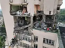 Damaged 25-storey residential building in Kyiv, 24 June 2023