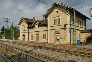 Two-story building with gabled roof