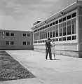 Rear view of Idaho Hall, Arlington Farms, showing the windows of the main lounge.