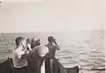 LST-487 crew searching for a Japanese pilot in the water