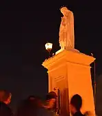 Effigy of Jesus Christ wearing the crown of thorns and purple robe.