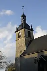 The bell tower of the church in La Couyère