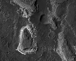 Ladon Valles, as seen by HiRISE.  Click on image to see dark and light-toned layers.