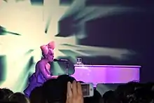 A picture of Lady Gaga on a piano