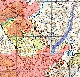 approximate maximum extent of Lake Disappear in blue, extent of Okete Volcanics in pink. The sinkhole is in the southwest corner of the lake. The stream re-emerges due south, near the foot of the map, disappears for another 200 metres, then joins Te Maari Stream and runs into Aotea Harbour. Diagram based on the 1971 one inch (contours in feet) and 1994 GNS 1:50,000 maps - sourced from LINZ.