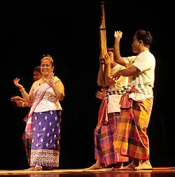 Image 3Mor lam performance-the men are playing the khene and wearing pha sarong (from Culture of Laos)