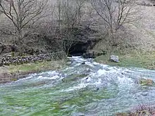 Lathkill Head Cave in wet conditions