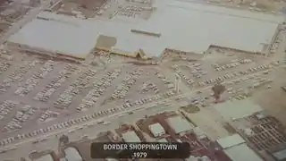 Photograph taken of an aerial shot of Border Shopping Town on public display at Lavington Square