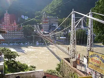 The supporting cables of suspension bridges follow a curve that is intermediate between a parabola and a catenary.