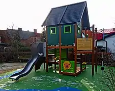 Playground in Ystad, Sweden in 2019. The colorful surface is soft rubber asphalt.