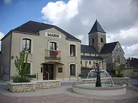 The town hall and church in Les Mesneux