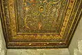 View of a painted ceiling with vegetal arabesque ornament