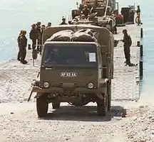 British Army Leyland 4-tonne general service (GS) truck leaving a Mexefloat pontoon.