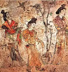 "A group of palace ladies in the gardens while a hoopoe flies by. Mural, tomb of Emperor Gaozong's 6th son, Li Xian, Qianling, Shaanxi, 706."