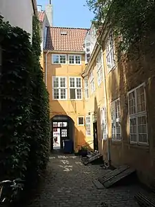 Courtyard: The rear side of the front wing.