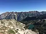 Little Cottonwood ridge line and Red Pine lake from ridge east of the Pfeifferhorn which is the easiest route to the summit.