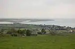 Llandanwg viewed from above the main road with Mochras (Shell Island) in the background