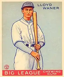 A baseball card image of a man wearing a white baseball uniform and a blue baseball cap holding a baseball bat