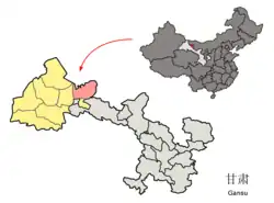 Jinta (pink) within Jiuquan prefecture (yellow) within Gansu (grey)