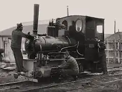 Convicts adjusting a locomotive, 1931