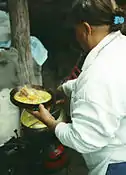 Locro being served at Simoca market, Argentina