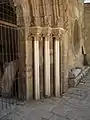 St. Nicholas Cathedral, Famagusta, Cyprus, Loggia Bembo, detail of the entrance, circa 1480s. The heraldic devices of the Bembo family are on the abaci of the pillars and visible on the end of the marble seat.