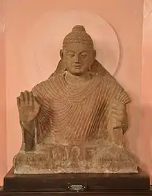 Buddha in Abhaya Mudra. Kushana-Gupta transitional period. Circa 3rd-4th century, Mathura.