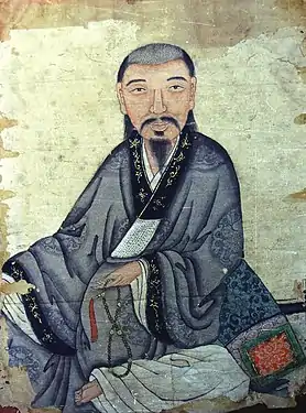 Portrait of Prince Nguyễn Phúc Thuần from the 17th century. He wears a cross-collared robe (áo giao lĩnh) which was commonly worn by Vietnamese aristocrats before the 19th century