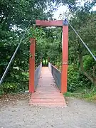 The suspension bridge over the Lugton Water