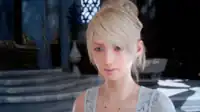 A blonde-haired, blue-eyed woman in a white dress, standing in a well-furnished room in daylight. She looks at something off camera with a fatigued expression.