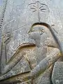 Seshat carved on the back of the throne of the seated statue of Rameses II in the Amun temple at Luxor. It dates from around 1250 BCE.