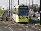 A M5000 tram having just left Ashton West