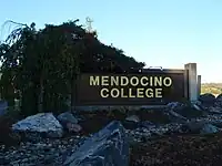 Name sign at campus entrance