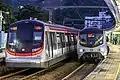 MTR Metro Cammell EMU (AC) seen next to its replacement, the Hyundai Rotem R-Train, at University Station in December 2021