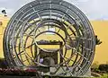 Diquís stone sphere inside a glass and steel spherical structure at the main entrance of Museo Nacional de Costa Rica.