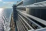 View of starboard side balconies and promenade deck below